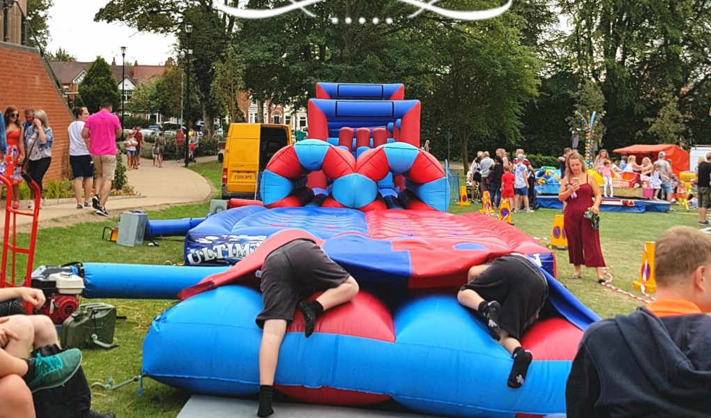 Hinckley feast, summer, holidays, kids having fun at bouncy castle.