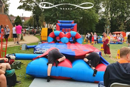 Hinckley feast, summer, holidays, kids having fun at bouncy castle.