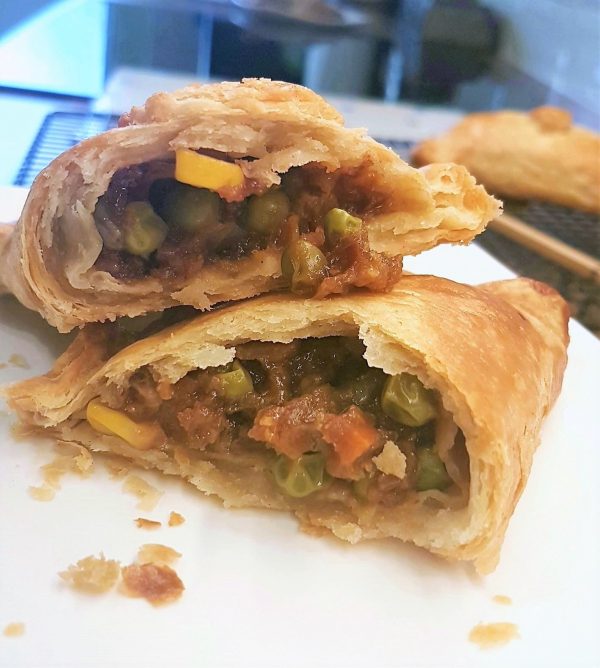 Sio Bao Pasty on a plate showing ther filling.