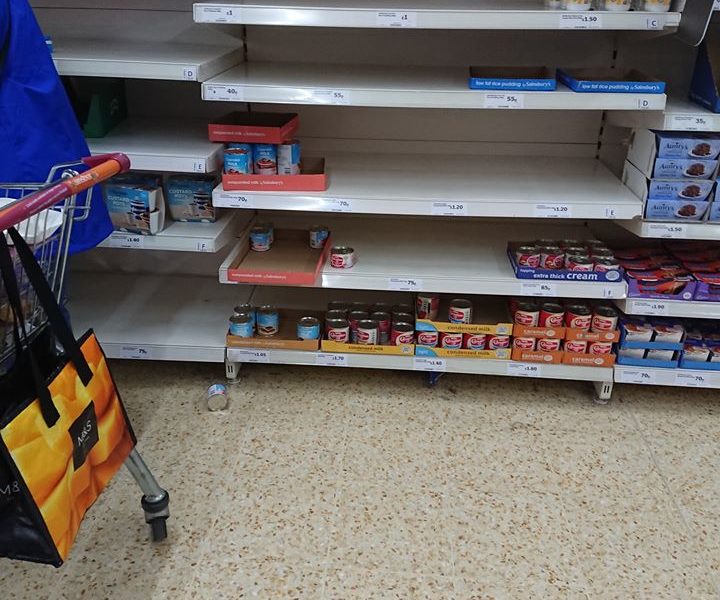 empty shelf in a super-market. No flour or essential food.