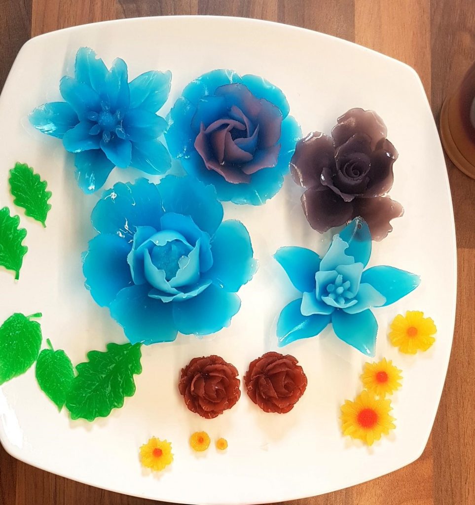 A collection of flowers in blue hues.