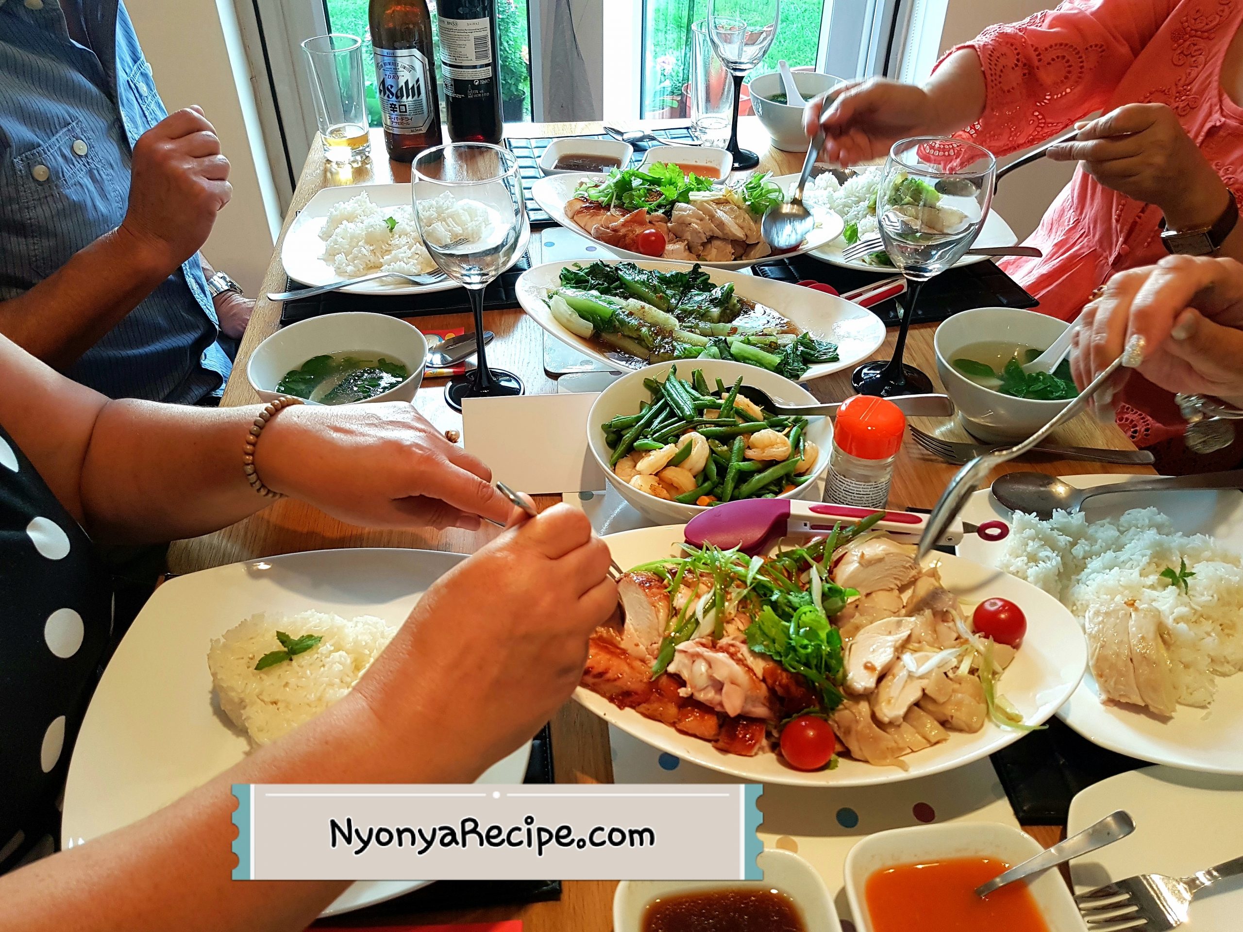 Diners enjoying Penang Hainanese Chicken Rice