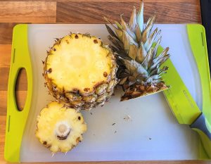 Crown & base of pineapple cut off.