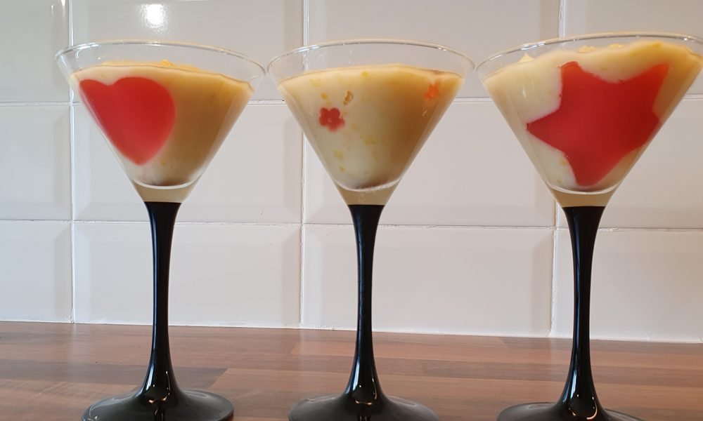 Sweet corn pudding served in cocktail glasses.
