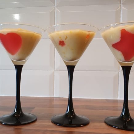 Sweet corn pudding served in cocktail glasses.