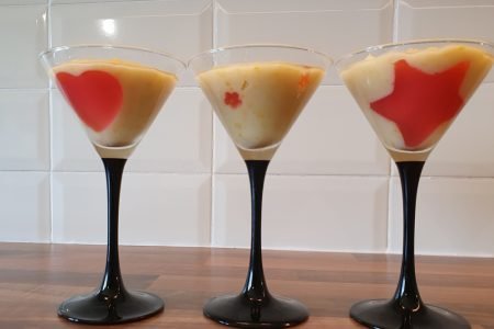 Sweet corn pudding served in cocktail glasses.