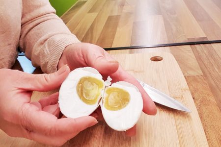 Salted duck egg cut open revealing the lovely yolk.
