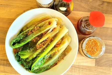 Blanched lettuce with garlic crisps and oil