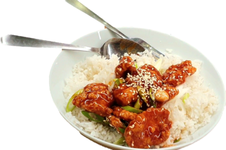 Tasty honey sesame chicken served with fluffy rice. Delicious.