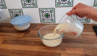 Pouring soy milk to make soy pudding