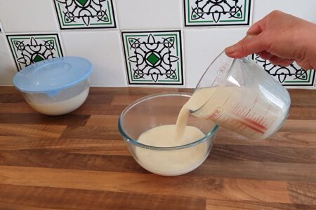 Pouring soy milk to make soy pudding