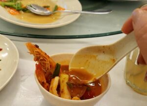 Tom Yum Kung, Prawn tom yum, served in small bowl. Hot and Spicy.