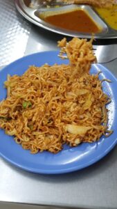 A plate of Maggie Mee goreng, or fried mee goreng maggi.