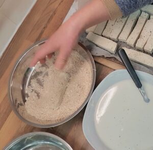 Tofu fingers is coated with panko crumbs.